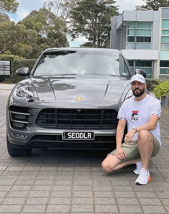 Paul Sera with luxury car